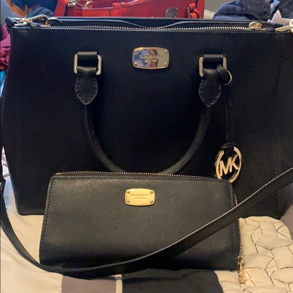 Authentic Michael kors black handbag and wallet